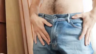 Boy wetting his jeans with pissing