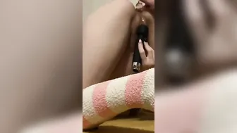 Pregnant eighteen takes glas booty plug inside fluffy socks