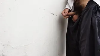 White boy pee into a white wall