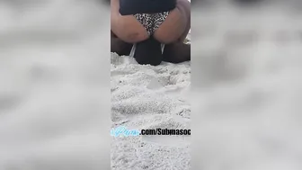 Caught face sitting on the beach