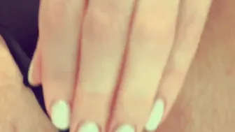 The sluts soaks her fingering with saliva and masturbates her juicy twat