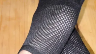 foot into socks. kapron socks. legs inside capron.