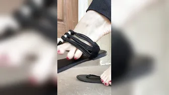 Fancy flip flop dangle on old mom toes