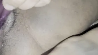 My twat all wett an creamy having fun into this vagina as I stroke husbands cock with my foot