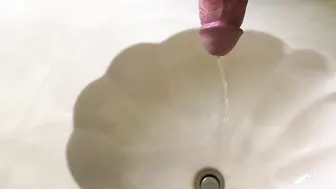 Huge Cock Takes Long Piss