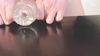 Amateur fucks clear fleshlight  jizzes on table