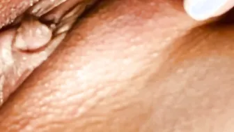 Slow-mo female masturbation. Close up leaking vagina