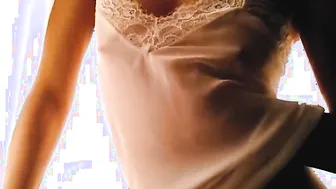 mom Tina behind the white curtain