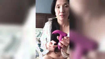 oriental Milf tries new vibrator from fan