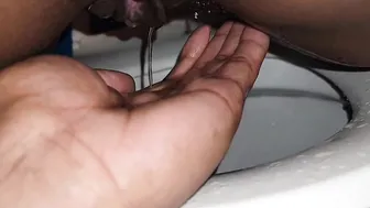 Beavis And Sluthead porn video – African cougar Sluthead takes a piss into someones hand