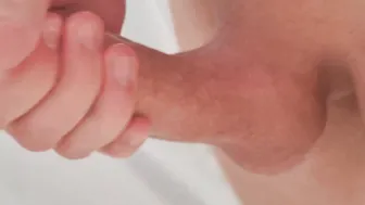 caressing my penis until he comes