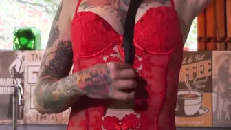 Gloves and a corset but no lingerie as she finger fucked her dripping cunt