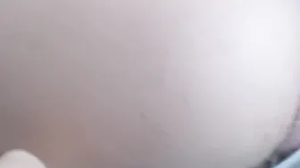 Pink Anal beads inside bushy asshole close up under white lingerie