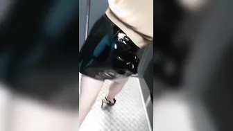 mom masturbates crossed legs standing inside outside elevator