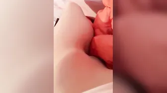 Masturbation squeezing a blanket between legs