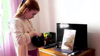 Pretty nude ginger Karolinka applying makeup