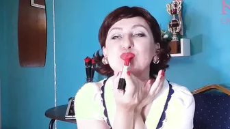 Red lipstick making out pose by Regina Noir.