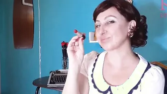 Red lipstick making out pose by Regina Noir.