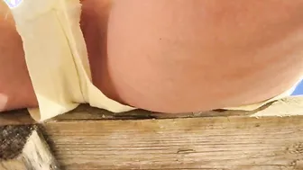 Secret look under the short shorts on the beach. Hot