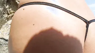 nippleringlover vulgar mom pissing outside at naked beach micro bikini