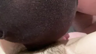 Licked bushy cunt close-up