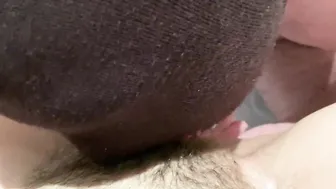 Licked bushy cunt close-up