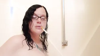Tatted bbw MILF hands free smoking having fun with titties