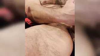 Close up of UNSHAVED MUSCLE BEAR STROKING PENIS