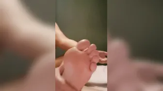 Rubbing lotion on my toes