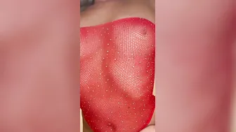 A whore inside Bombshell red panties shows her tits.
