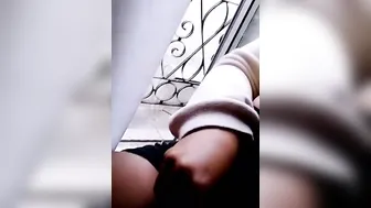 I get caught having fun with my nipples on balcony