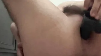 Latino taking sex toy into the butt