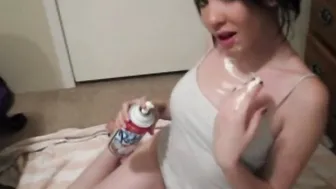 Small Red Bimbo having fun and rubbing cream on titties