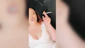Smoking Hot porn video – Bella smoking into a amazingly hot white dress