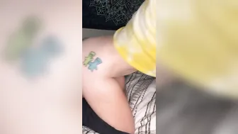 Miss Coxxx grips a toy while wearing a light up ass plug