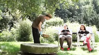 Submissive gardener toyed around by 2 fatties