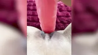 Close-up masturbation with huge pink sex toy and powerful pink dildo