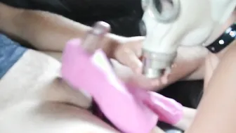 Gasmaked sluts make Pvc Glove Hand Job