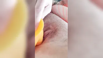 Close up MILF pounded by big orange penis sex toy