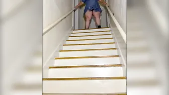 Mrs. A pissings on the stairs