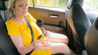 Lady Sonia plays with her magic wand inside the vehicle