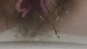 Older unshaved snatch pee close up. A older bbw with