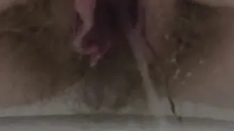 Older unshaved snatch pee close up. A older bbw with
