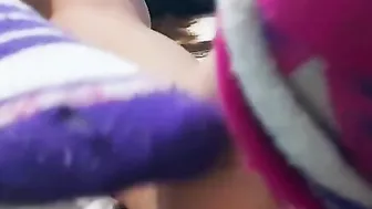 Oriental women taking off socks with Bombshell soles