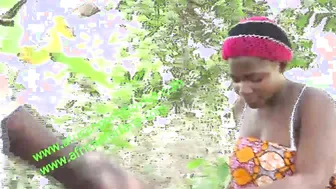 Beauty and wild outdoors pounded at the river between a bodybuilder and a next door during laundry into Cameroon Africa. to