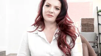 Red Haired cougar stepmother Emmy Demure giving titjob to console her stepson