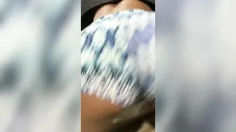 Shaking booty over bed inside butt shorts