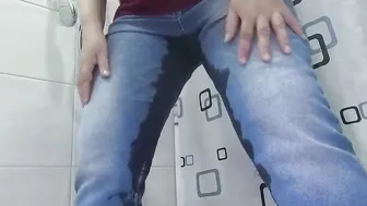 Pissing desperation wetting jeans