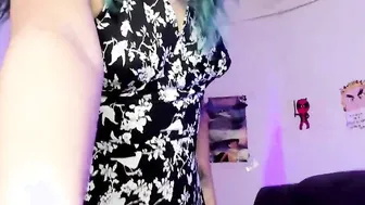 PART one: Young women tries on clothes inside front of
