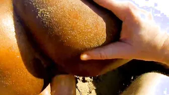 Black getting huge white cock public on the beach